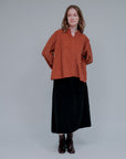 Center Trim Stand Collar Long Sleeve Top in Terra_Front
