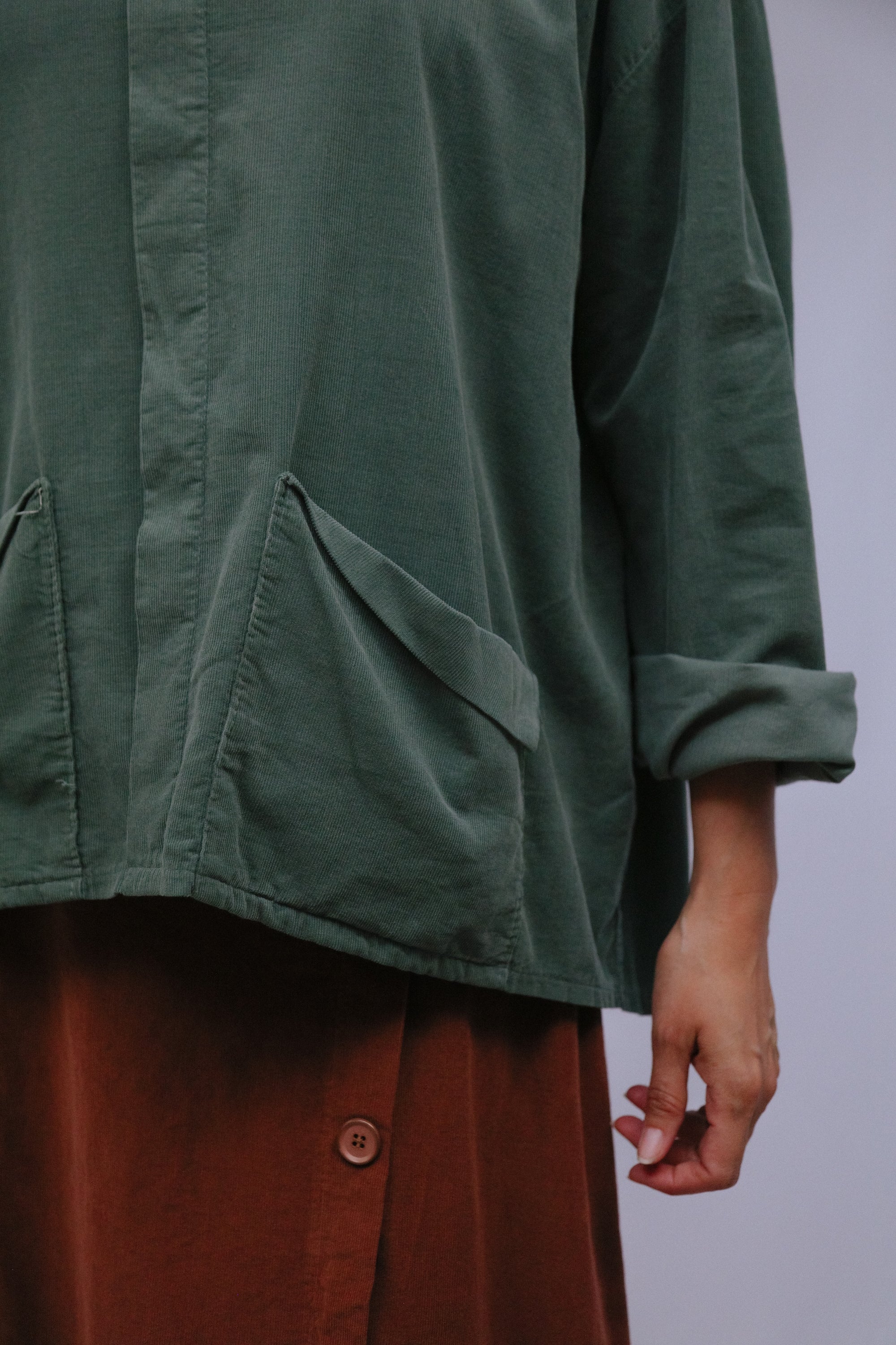 Center Seam Cowl Top Pocket Detail in Olive