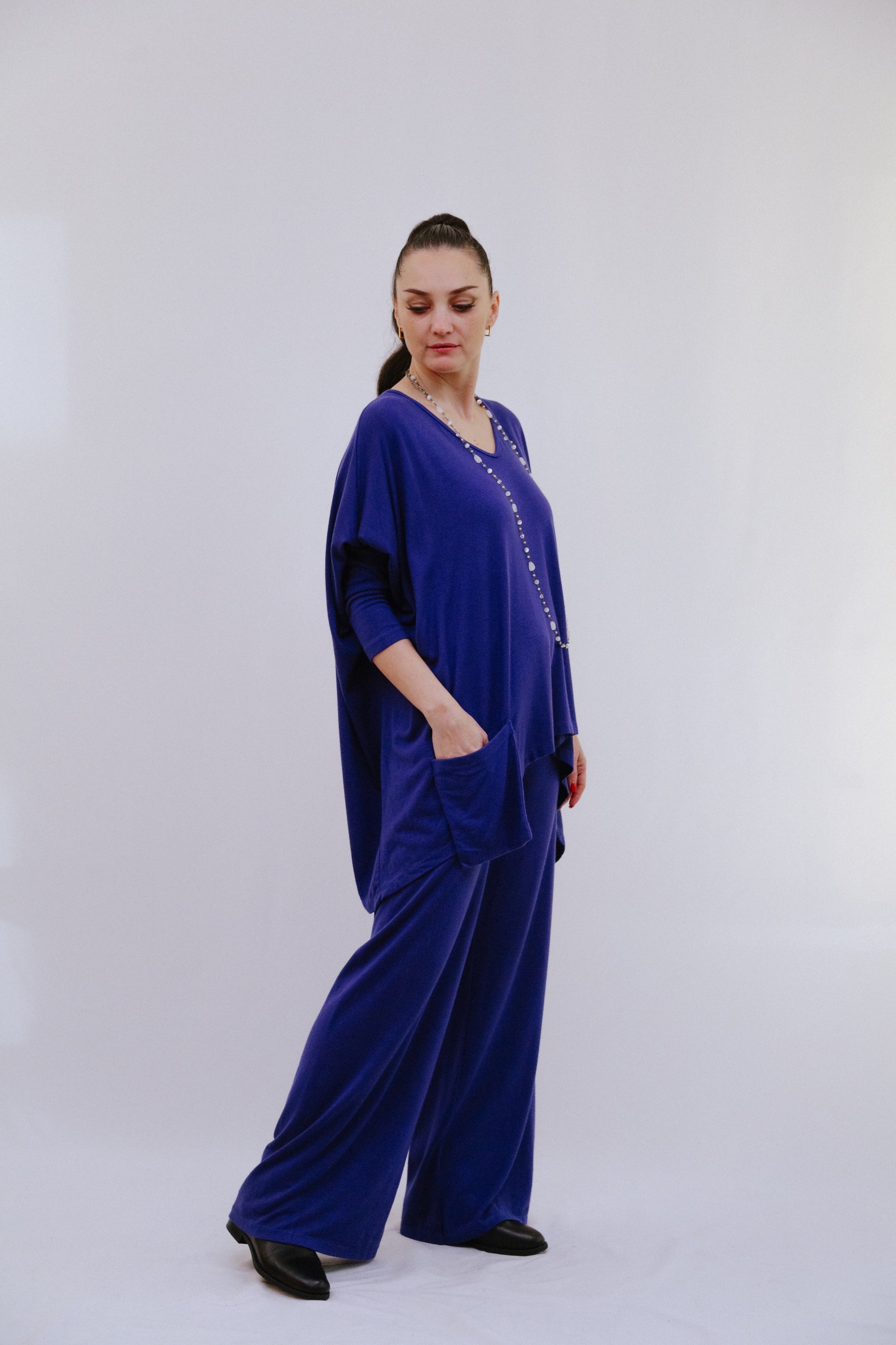 Saga V Neck One Pocket Top in Blue Side View