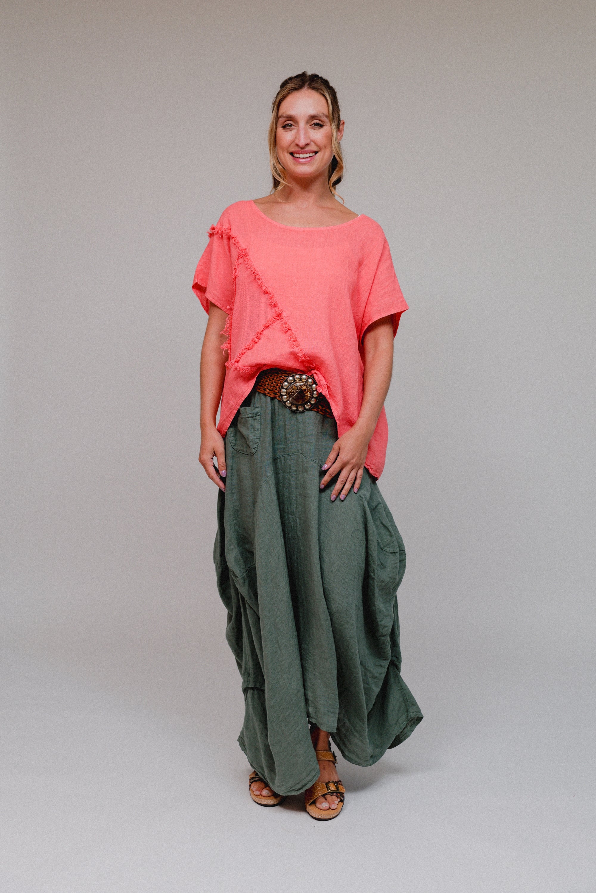 Raw Edge Extended Sleeve Sharkbite Top Coral Front